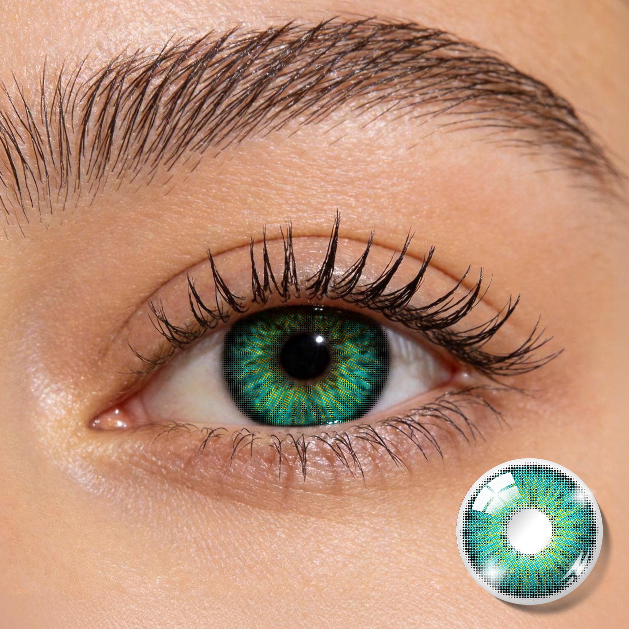 Close-up shot of an eye wearing MIIEMO Teal Aura Halation colored contact lens showing natural gradient blending