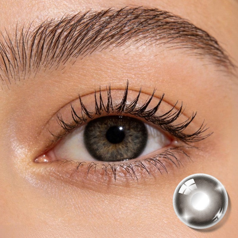 Close-up shot of an eye wearing MIIEMO Halo Brown colored contact lens showing soft black-brown gradient design