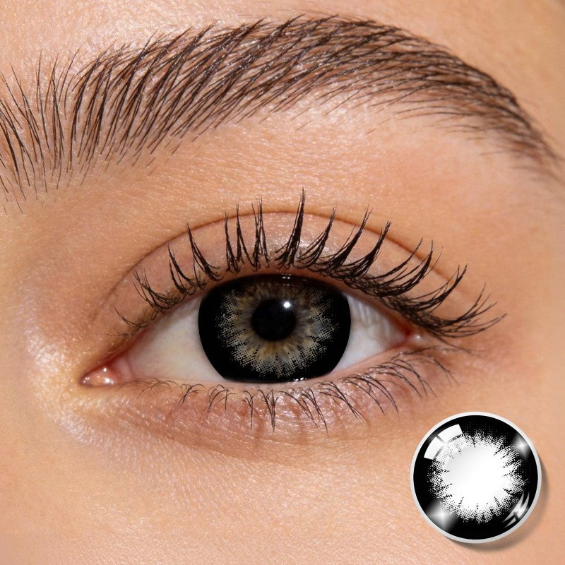 Close-up shot of an eye wearing MIIEMO Noir Spark Black colored contact lens showing subtle sparkle black design