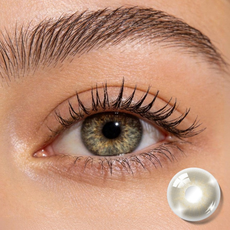 Close-up shot of an eye wearing MIIEMO Natural Chocolate contact lenses creating a naturally deeper and more defined gaze