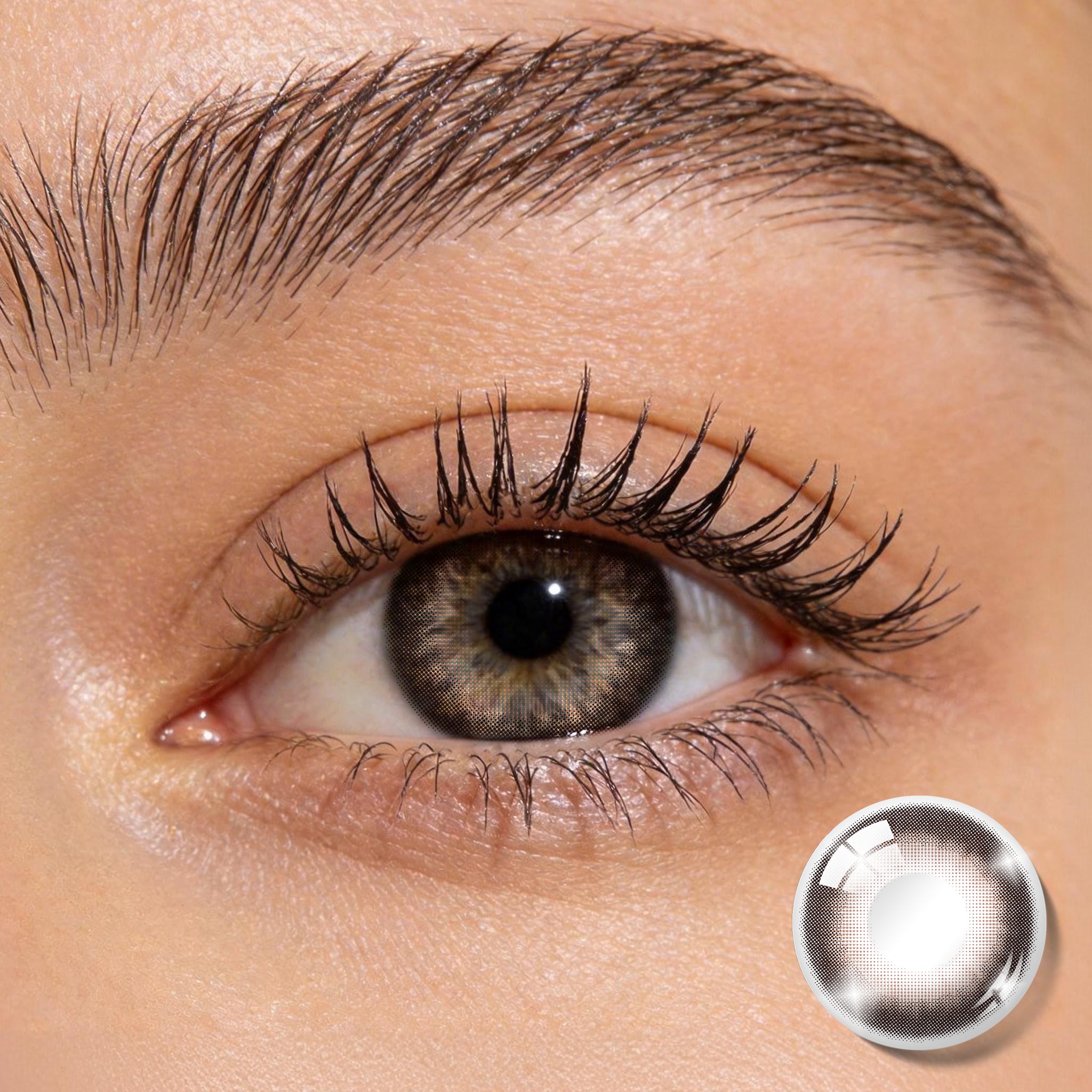 Close-up shot of an eye wearing Caramel Brown Grid Pattern colored contact lenses showing warm brown tones