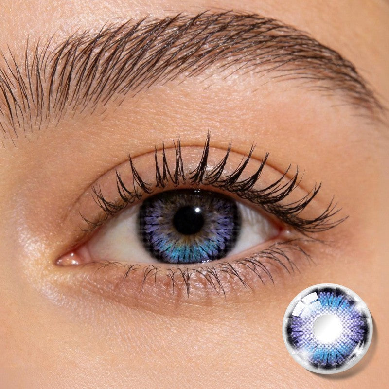 Close-up shot of an eye wearing MIIEMO Nebula Violet Blue colored contact lens showing stunning purple blue gradient